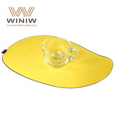 China Leading Two-sided Wholesale Custom Pattern Microfiber Vegan Leather for table mat Supplier